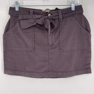 Chaser Revolve Denim Belted Mini Skirt